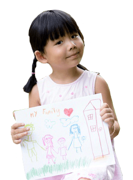 child holding up drawing of family